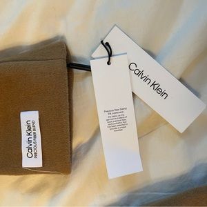 Calvin Klein women’s mid length camel coat